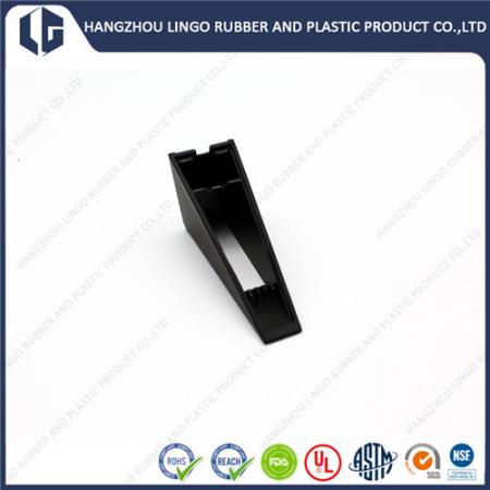 Black Plastic Piece That Can Be Used To Level Ceramic Tiles